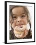 Girl Holding a Doughnut with Sprinkles, Partly Eaten-null-Framed Photographic Print