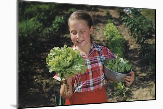 Girl Holding Head of Lettuce in Garden-William P. Gottlieb-Mounted Photographic Print