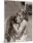 Girl Holding Puppy-Philip Gendreau-Mounted Photographic Print