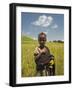 Girl Holding Yellow Meskel Flowers in a Fertile Green Wheat Field after the Rains-Gavin Hellier-Framed Photographic Print