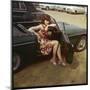 Girl in a Classic Racing Green "MGB" Sports Car-null-Mounted Art Print