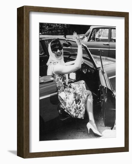 Girl in a Flower Print Dress, High Heels, Headscarf and Sunglasses Steps out of a Convertible Car-null-Framed Photographic Print