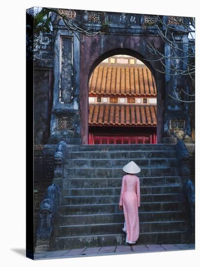 Girl in Ao Dai (Traditional Vietnamese Long Dress) and Conical Hat at Minh Mang Tomb, Vietnam-Keren Su-Stretched Canvas