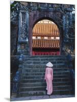 Girl in Ao Dai (Traditional Vietnamese Long Dress) and Conical Hat at Minh Mang Tomb, Vietnam-Keren Su-Mounted Photographic Print