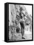 Girl in Bikini Walks Along a Cliff Path on a Fine Summer Day-null-Framed Stretched Canvas