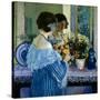 Girl in Blue Arranging Flowers (Oil on Canvas)-Frederick Carl Frieseke-Stretched Canvas