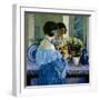 Girl in Blue Arranging Flowers (Oil on Canvas)-Frederick Carl Frieseke-Framed Giclee Print