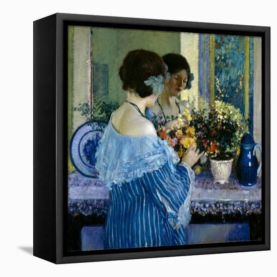 Girl in Blue Arranging Flowers (Oil on Canvas)-Frederick Carl Frieseke-Framed Stretched Canvas