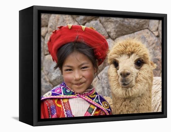 Girl in Native Dress with Baby Alpaca, Sacsayhuaman Inca Ruins, Cusco, Peru-Dennis Kirkland-Framed Stretched Canvas