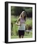 Girl Jogging with Headphones-null-Framed Premium Photographic Print