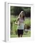 Girl Jogging with Headphones-null-Framed Premium Photographic Print