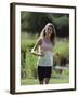 Girl Jogging with Headphones-null-Framed Photographic Print