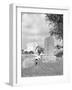 Girl Kneels at Headstone-Philip Gendreau-Framed Photographic Print