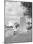 Girl Kneels at Headstone-Philip Gendreau-Mounted Photographic Print