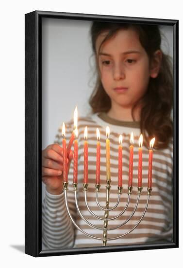 Girl lighting Hannuka candles, Montrouge, France-Godong-Framed Photographic Print