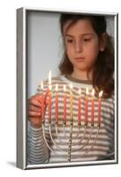 Girl lighting Hannuka candles, Montrouge, France-Godong-Framed Photographic Print