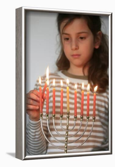 Girl lighting Hannuka candles, Montrouge, France-Godong-Framed Photographic Print