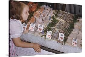 Girl Looking at Seafood Display-William P. Gottlieb-Stretched Canvas