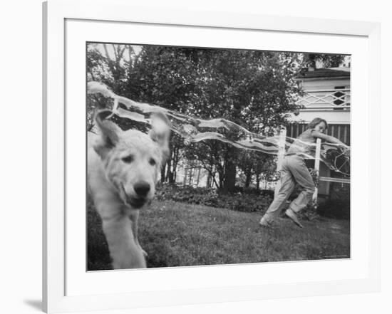 Girl Making Huge Bubbles with Soapy Solution and Large Ring in Yard-Stan Wayman-Framed Photographic Print