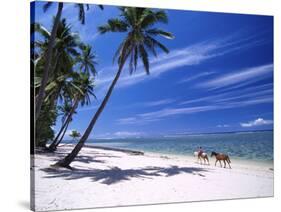 Girl on Beach with Coconut Palm Trees, Tambua Sands Resort, Coral Coast, Fiji-David Wall-Stretched Canvas