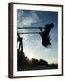 Girl Playing High on Swings at Sunset on Vosu Beach, Located in Lahemaa National Park-Christian Kober-Framed Photographic Print