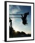 Girl Playing High on Swings at Sunset on Vosu Beach, Located in Lahemaa National Park-Christian Kober-Framed Photographic Print