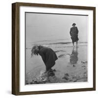 Girl Playing in the Sand while an Older Woman Gets Her Feet Wet in the Ocean at Blackpool Beach-Ian Smith-Framed Photographic Print