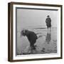 Girl Playing in the Sand while an Older Woman Gets Her Feet Wet in the Ocean at Blackpool Beach-Ian Smith-Framed Photographic Print