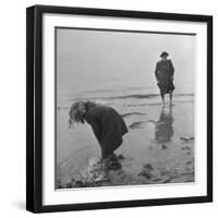 Girl Playing in the Sand while an Older Woman Gets Her Feet Wet in the Ocean at Blackpool Beach-Ian Smith-Framed Photographic Print