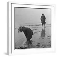 Girl Playing in the Sand while an Older Woman Gets Her Feet Wet in the Ocean at Blackpool Beach-Ian Smith-Framed Photographic Print