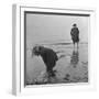 Girl Playing in the Sand while an Older Woman Gets Her Feet Wet in the Ocean at Blackpool Beach-Ian Smith-Framed Photographic Print