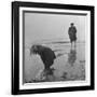 Girl Playing in the Sand while an Older Woman Gets Her Feet Wet in the Ocean at Blackpool Beach-Ian Smith-Framed Photographic Print