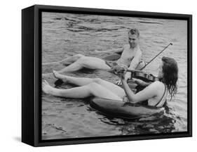 Girl Playing Violin For Boy as They Float on Inner Tube Sat Floating Party on the Apple River-Alfred Eisenstaedt-Framed Stretched Canvas