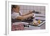 Girl Preparing Breakfast in Kitchen-William P. Gottlieb-Framed Photographic Print