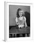 Girl Putting Money in Piggy Bank-Philip Gendreau-Framed Photographic Print