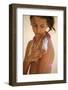 Girl putting on sunblock-Godong-Framed Photographic Print