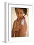 Girl putting on sunblock-Godong-Framed Photographic Print