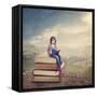 Girl Reading a Book on a Stack of Books-egal-Framed Stretched Canvas