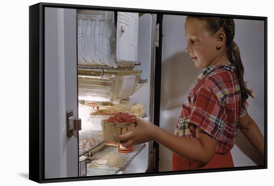 Girl Removing Raspberries from Freezer-William P. Gottlieb-Framed Stretched Canvas