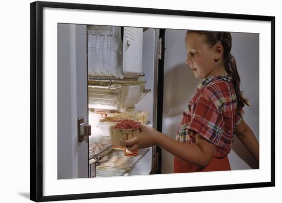 Girl Removing Raspberries from Freezer-William P. Gottlieb-Framed Photographic Print