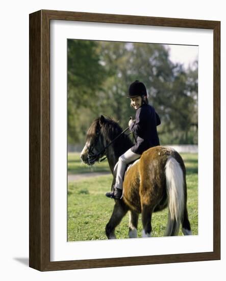 Girl Riding on a Pony-null-Framed Photographic Print