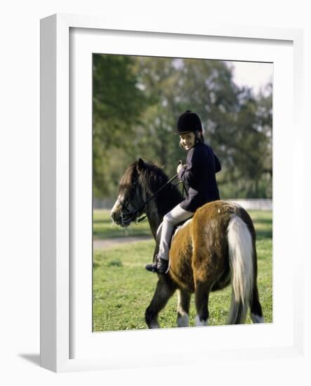 Girl Riding on a Pony-null-Framed Photographic Print