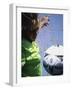 Girl Standing in a Goal Looking at a Soccer Ball-null-Framed Photographic Print