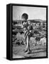 Girl Standing in Rubble from the Korean Civil War, Carrying a Baby in a Sling on Her Back-Joe Scherschel-Framed Stretched Canvas