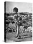 Girl Standing in Rubble from the Korean Civil War, Carrying a Baby in a Sling on Her Back-Joe Scherschel-Stretched Canvas