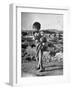 Girl Standing in Rubble from the Korean Civil War, Carrying a Baby in a Sling on Her Back-Joe Scherschel-Framed Photographic Print