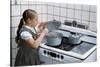 Girl Stirring Soup in Kitchen-William P. Gottlieb-Stretched Canvas