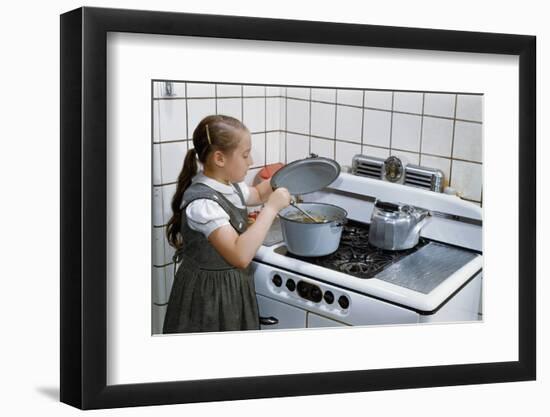 Girl Stirring Soup in Kitchen-William P. Gottlieb-Framed Photographic Print