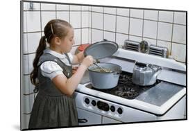 Girl Stirring Soup in Kitchen-William P. Gottlieb-Mounted Photographic Print