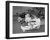 Girl Unwrapping a Gift-Philip Gendreau-Framed Photographic Print